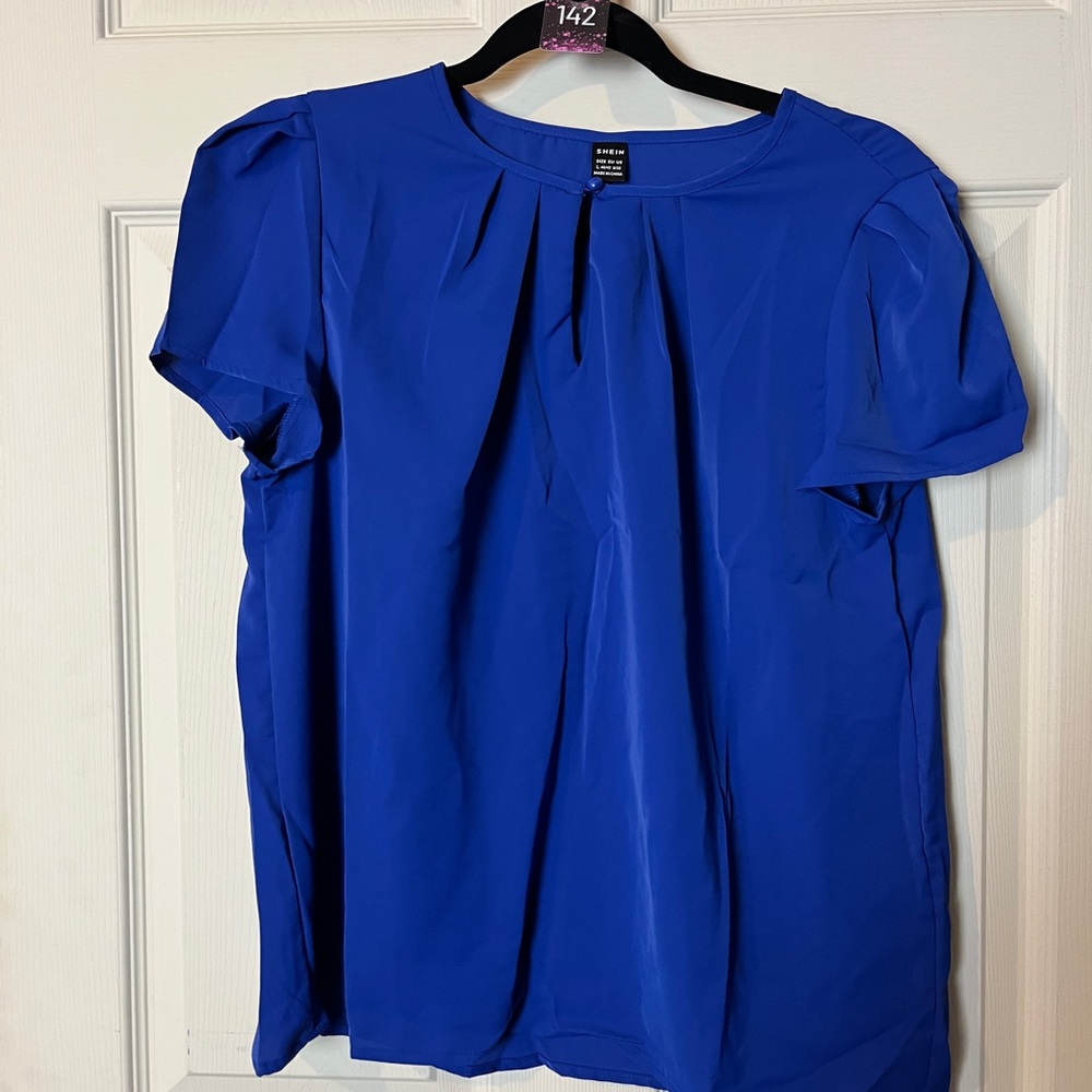 142. SHEIN size US 8/10 blue blouse